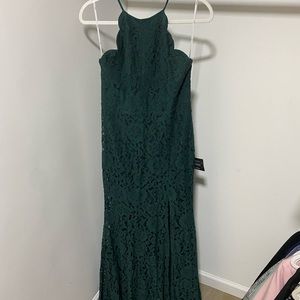 Emerald green sleeveless lace gown